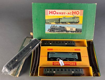 a box with a train set inside of it on a table