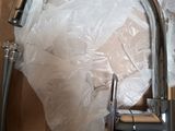 a picture of a faucet that is in a box