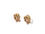 a pair of gold earrings on a white background