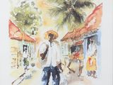 framed watercolor painting of a man walking down a street with an umbrella