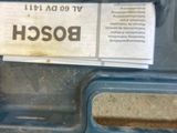 a blue box with a label on it that says bosch