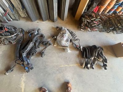 a lot of assorted items on the floor of a garage