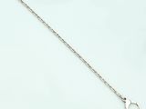 a close up of a chain on a white surface