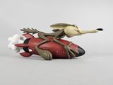 figurine représentant un chien à bord d'un avion rouge avec un nuage blanc
