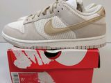Nike Dunk Dunk Low blanche et dorée