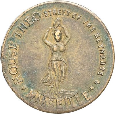 une vieille pièce de monnaie sur laquelle figure une femme tenant une raquette de tennis