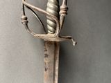 an image of a sword that is on display