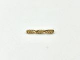 an image of a gold plated pin with a design on it