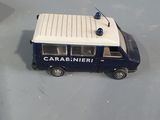 a small toy car that is sitting on a table