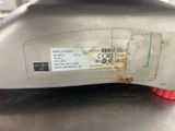 a close up of a metal object with a label on it