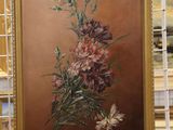 une photo d'un tableau représentant des fleurs, exposé dans un magasin