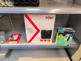 a display of electronics on the shelves in a store