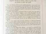 an open page of a book with a picture of a horse