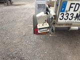 a truck that has a license plate on the back of it
