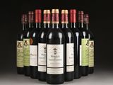 six bottles of wine are lined up in a row on a table