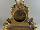 a clock that is sitting on top of a table