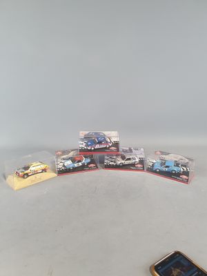 a cell phone sitting on a table next to a pile of legos