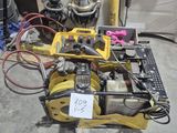 a lot of tools that are sitting on the floor