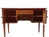 a wooden desk with drawers and a drawer on top of it