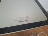 a laptop computer sitting on top of a table
