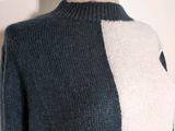 a picture of a sweater on a mannequin mannequin mannequin mannequin mannequin mannequin mannequin manne