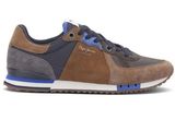 a close up of a brown and blue sneaker on a white background