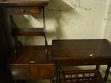 a small desk and a chair in a room
