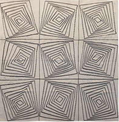 quatre carrés d'encre noire et blanche sur une feuille de papier blanc