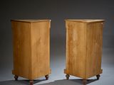 pair of art deco nightstands on casteors