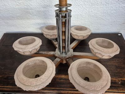 a wooden table with a candle holder on it