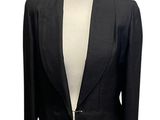 a picture of a black jacket on a mannequin dummy