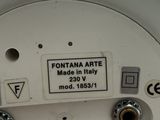 a close up of a toilet seat with a label on it