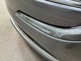 a close up view of a car ' s front bumper