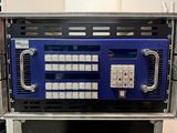 a blue box that has some sort of electronic equipment in it