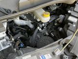 a car engine with the hood open and the hood down