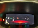 an image of a car dashboard with a digital display