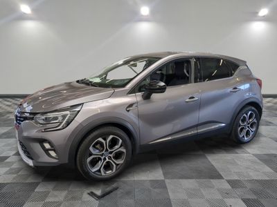 the new renault c - cross suv is parked in a showroom