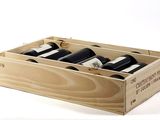 bottles of wine in a wooden box on a white background