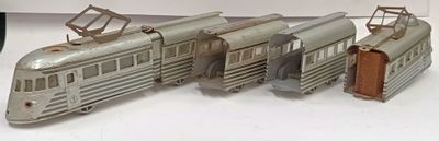 three model trains that are sitting on a table