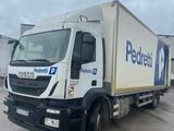 a picture of a delivery truck parked in a parking lot