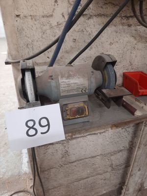 a machine that is sitting on a table with a sign on it