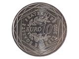 une vieille pièce en euros sur laquelle figure l'image d'un oiseau