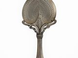 a silver hand held mirror on a white background