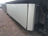 an image of a truck with a refrigerator in the back of it