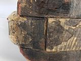 a piece of wood sitting on top of a white surface