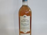 a bottle of alcohol that is sitting on a table
