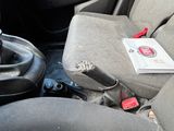 a picture of the inside of a car with a steering control