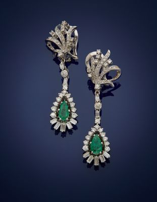 a pair of emerald and diamond earrings