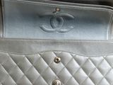 chanel silver quilted leather clutch bag