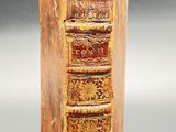 an old book that is sitting on a table
